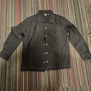 Unisex Reclaimed Vintage unisex pants in black nylon with white contrast stitch